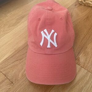 Pink/Peach colored Adjustable New York Yankee’s Hat